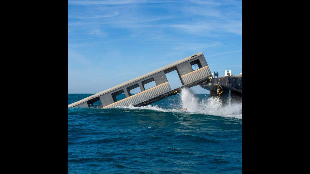 The 72-foot-long subway cars were pushed off barges in December 2023 to be part of a growing artificial reef off Georgia, the state reports.