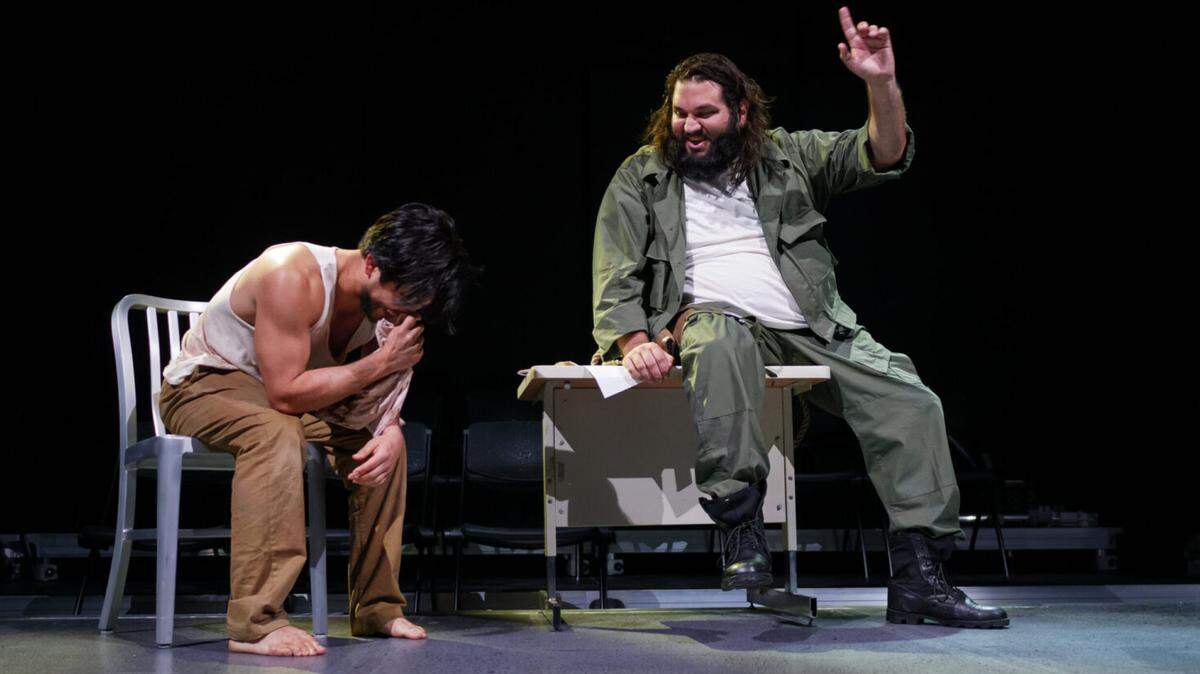David Zaldívar, left, and Robby Ramos in the world premiere of ‘The Walls Have Ears’ at the Westchester Cultural Arts Center, being performed first in English, then with a run in Spanish.