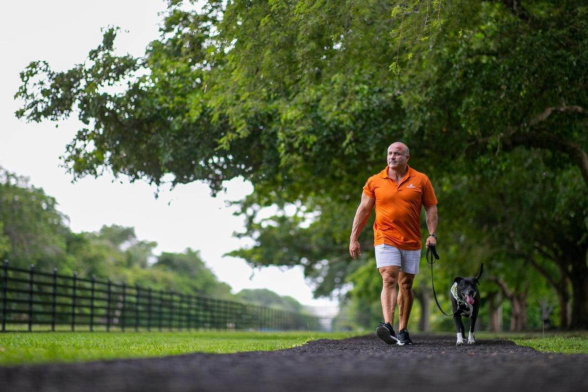 Nick Molina, the founder of Hungry Bark, visits Dante Fascell Park in Miami with his dog, Shorty, on Oct. 6, 2020.