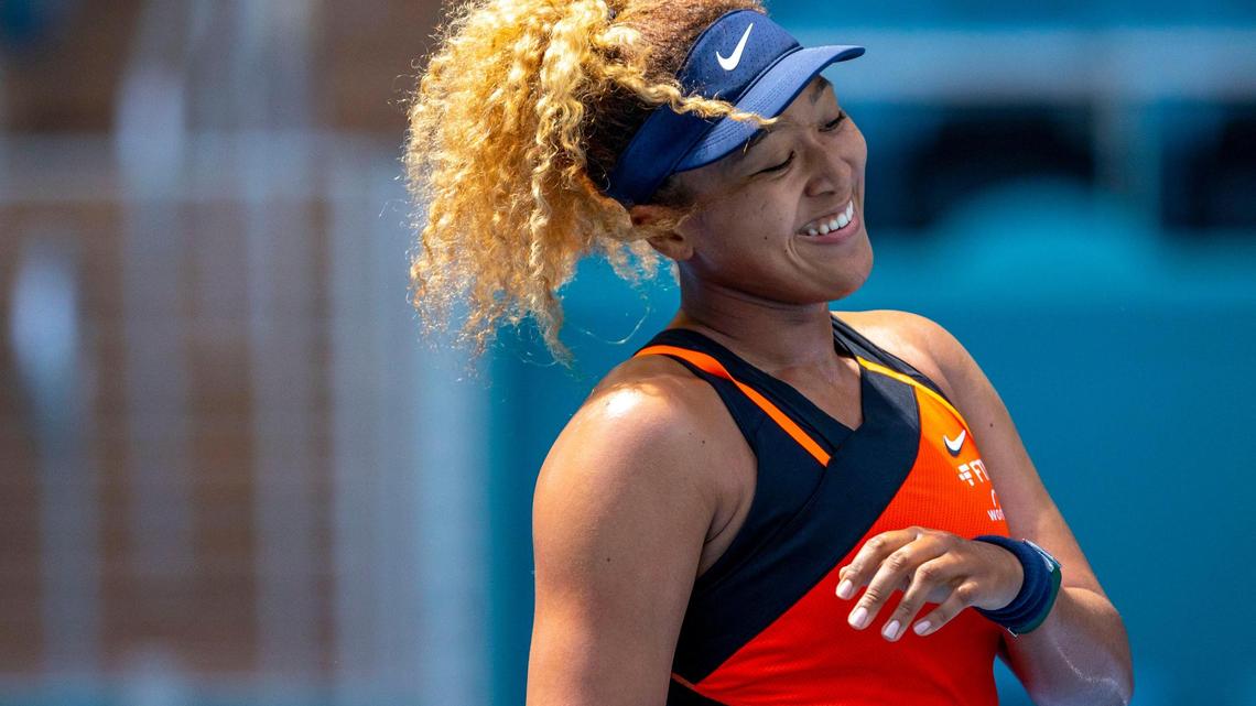 Naomi Osaka of Japan reacts after scoring a point against Astra Sharma of Australia during their first round match at the Miami Open tennis tournament at Hard Rock Stadium in Miami Gardens, Florida, on Wednesday, March 23, 2022.