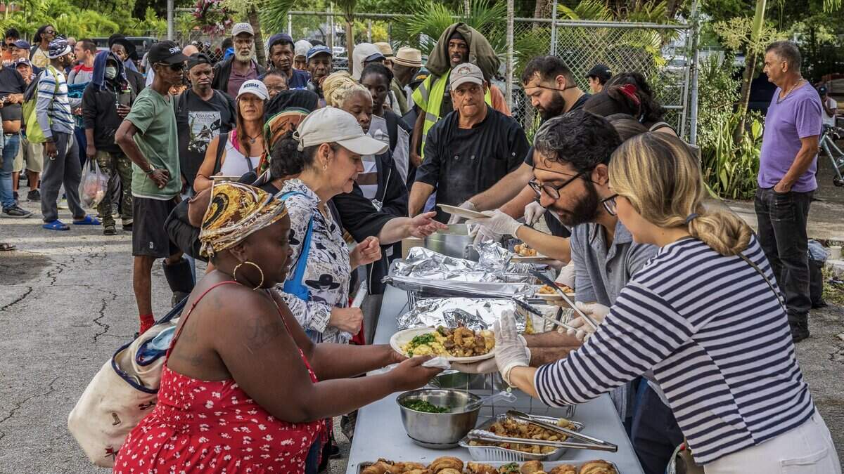 Volunteers serve breakfast to individuals experiencing food insecurity at the Greater Bethel African Methodist Episcopal Church in Overtown, Miami, on Friday, June 5, 2026.