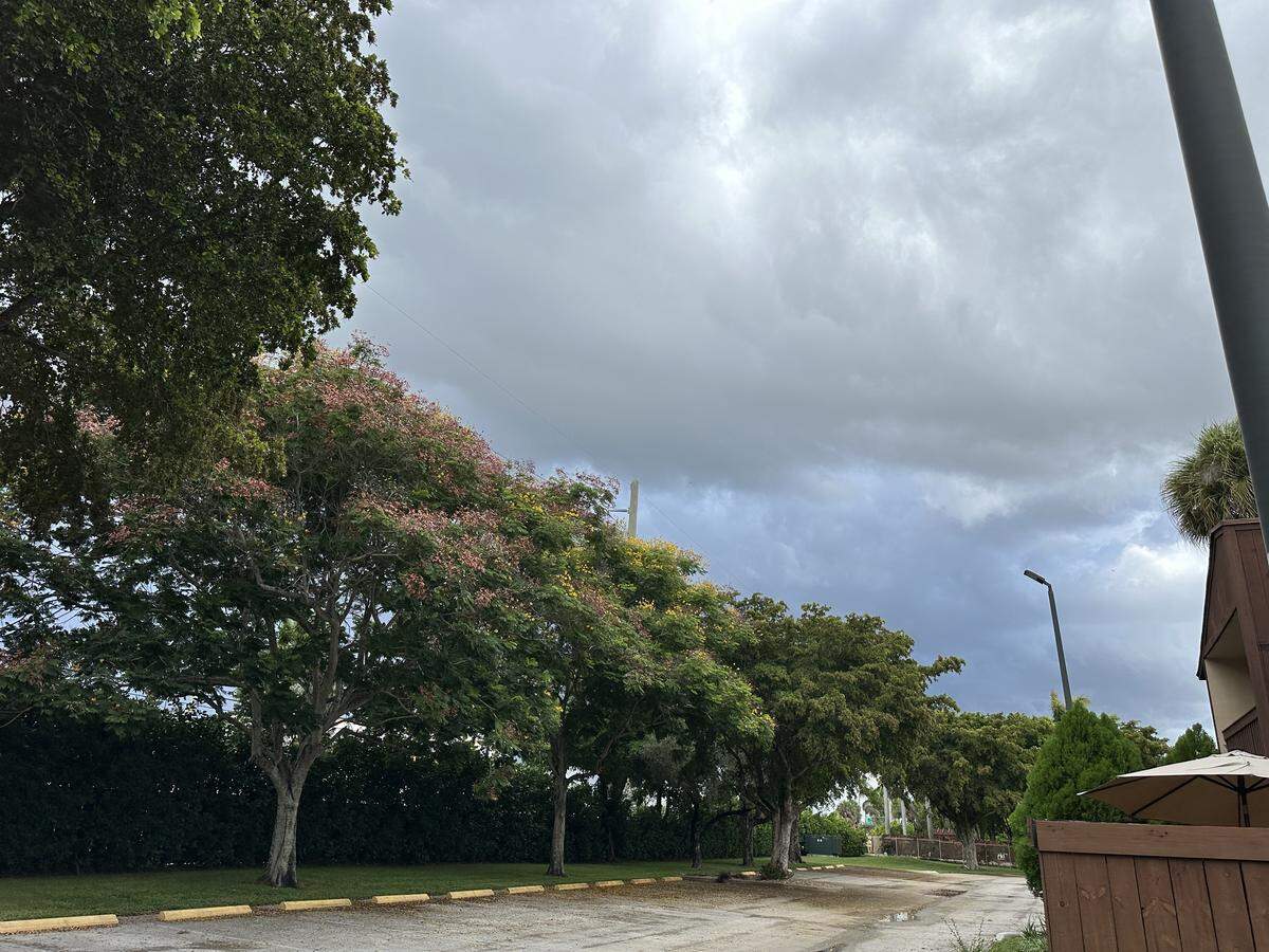 Thunder claps overhead as storm clouds roll in to a Kendall neighborhood on Aug. 6, 2025. Rain is in the forecast.