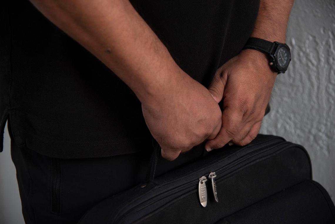 “One does not even work comfortably because you spend the whole day in fear that at any moment, on any corner you can be stopped,” this Venezuelan man facing deportation said in Spanish on July 14, 2019. The briefcase he carries with him contains immigration paperwork he can present to authorities if he is apprehended. Immigration and Customs Enforcement deportation raids were projected to begin today after a two-week postponement.