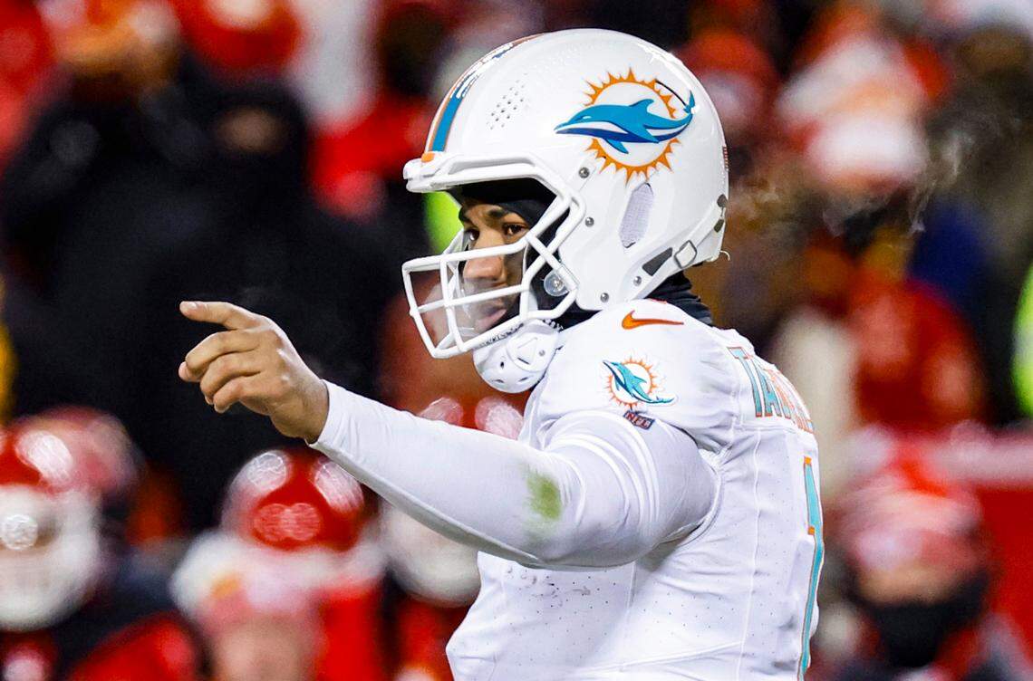 Miami Dolphins quarterback Tua Tagovailoa (1) gestures during the game against the Kansas City Chiefs in the second half of the NFL wild-card playoff at GEHA Field at Arrowhead Stadium in Kansas City, Missouri, on Saturday, January 13, 2024.