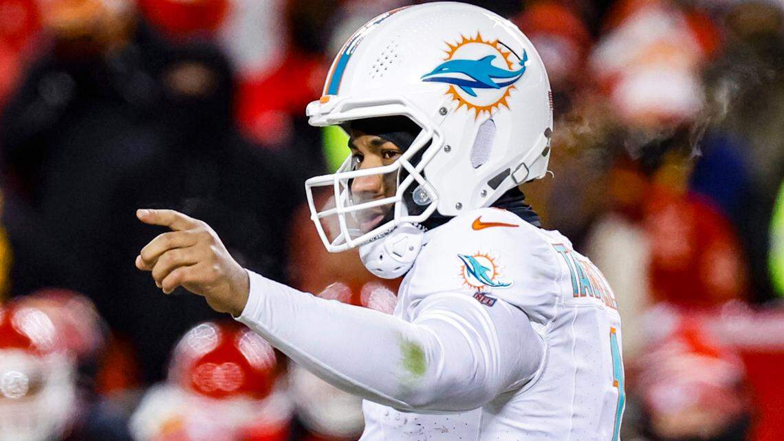 Miami Dolphins quarterback Tua Tagovailoa (1) gestures during the game against the Kansas City Chiefs in the second half of the NFL wild-card playoff at GEHA Field at Arrowhead Stadium in Kansas City, Missouri, on Saturday, January 13, 2024.