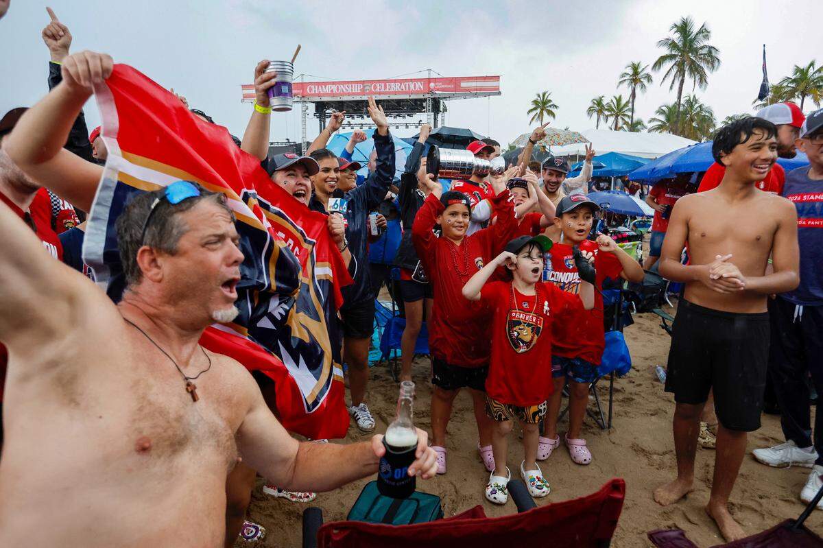 The rain didn’t stop Panthers fans as they cheers during the Stanley Cup victory parade at Fort Lauderdale Beach on Tuesday, June 30, 2024 in Fort Lauderdale.&nbsp;