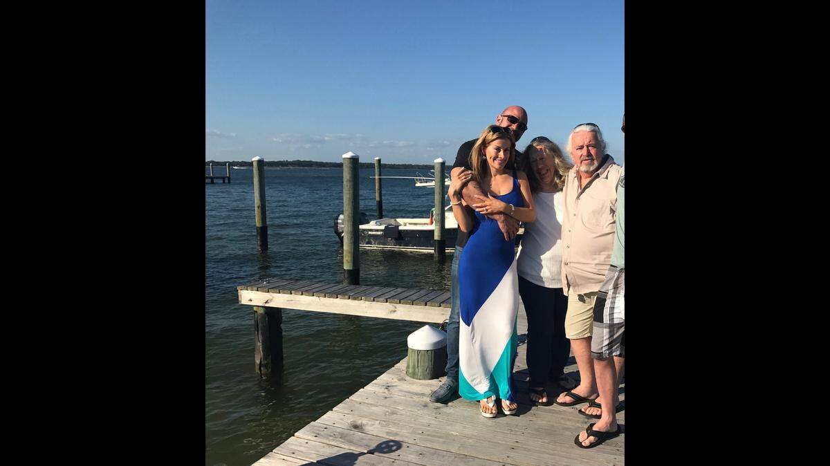 David Coriaty and Rachel Ehrenreich. with her parents, John and Maggie Ehrenreich.