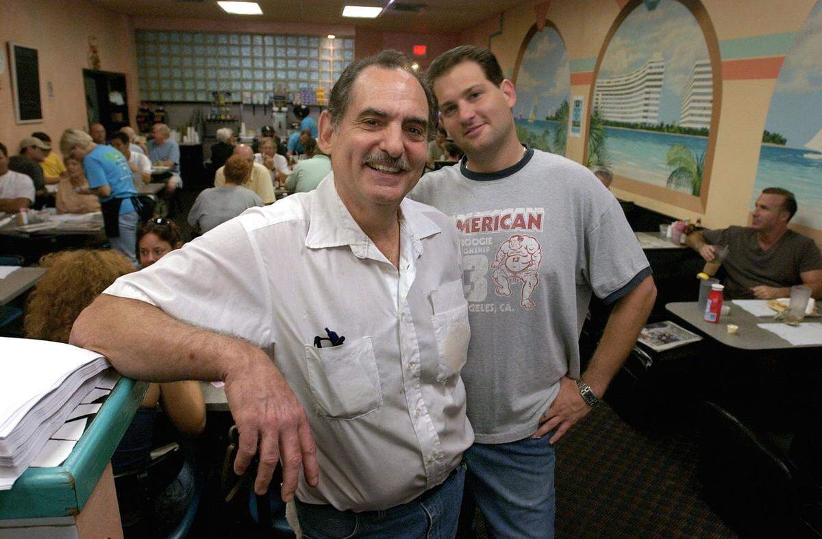 In 2002, Arnie & Richie’s Deli at 525 Arthur Godfrey Road. Owners Arnie London, left, and his son Troy, right.