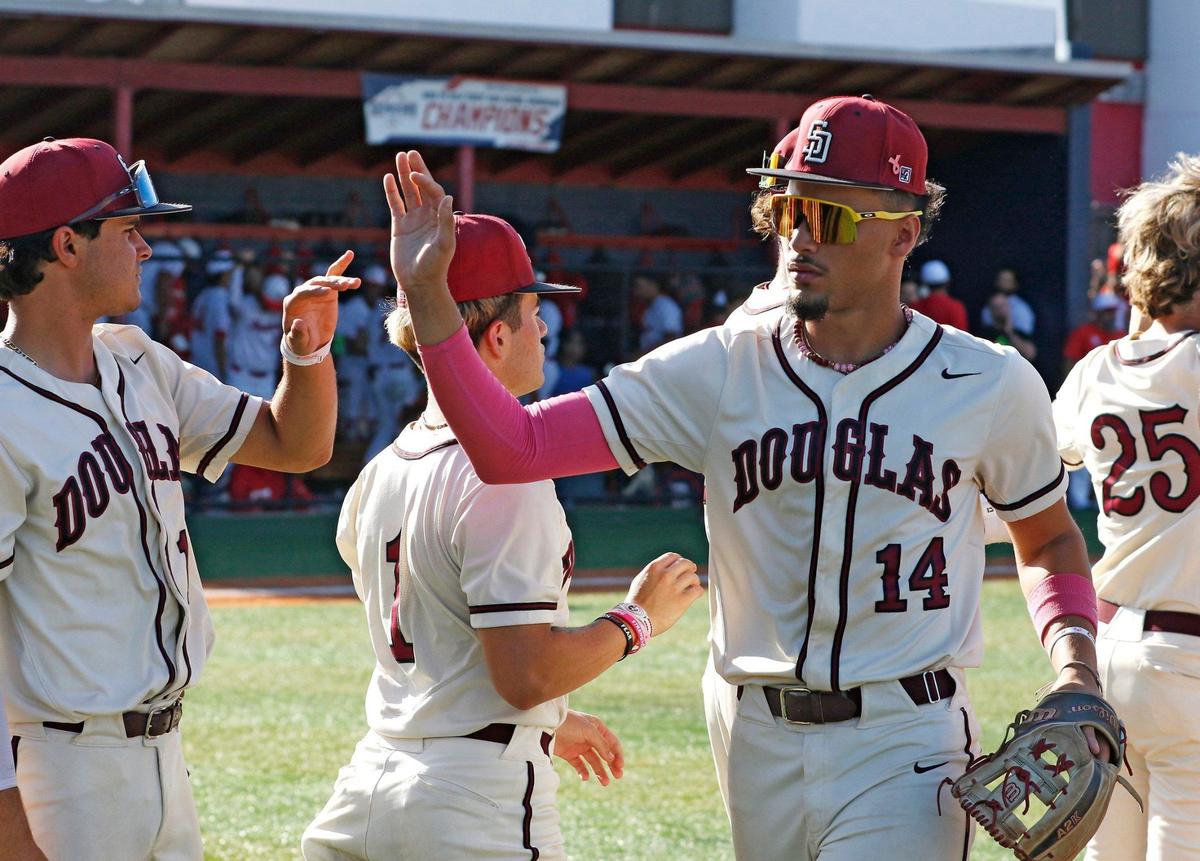 Stoneman Douglas Eagles Rylan Lujo (14) celebrates a home run during the baseball game against Doral Academy Firebirds on Friday, April 19, 2024 at Doral Academy HS in Doral. Andrew Uloza / for Miami Herald