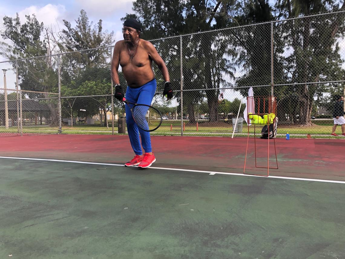 Willie “Slim” Jackson practices his serve at the Arcola Lakes Park on Wednesday, April 29, 2020, hours after Miami-Dade reopened parks and recreational facilities.