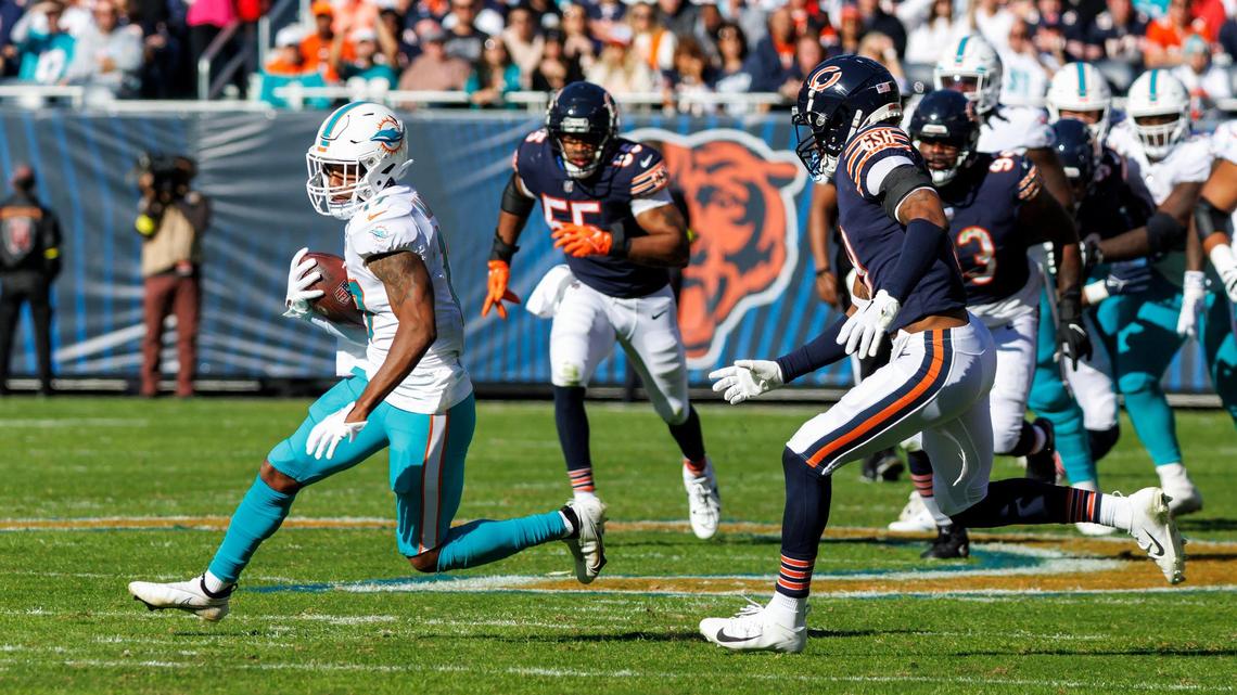 Miami Dolphins wide receiver Jaylen Waddle (17) runs with the football during second quarter of an NFL football game against the Chicago Bears at Soldier Field on Sunday, November 6, 2022 in Chicago, Illinois.