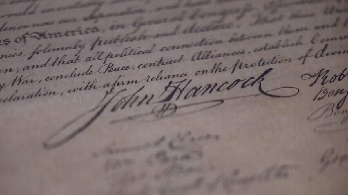 An etching of the Declaration of Independence bearing John Hancock's signature is displayed during a press preview of the “250 Founding Documents Exhibit” at the Museum of Miami in Miami, Fla., on Wednesday, June 17, 2026.