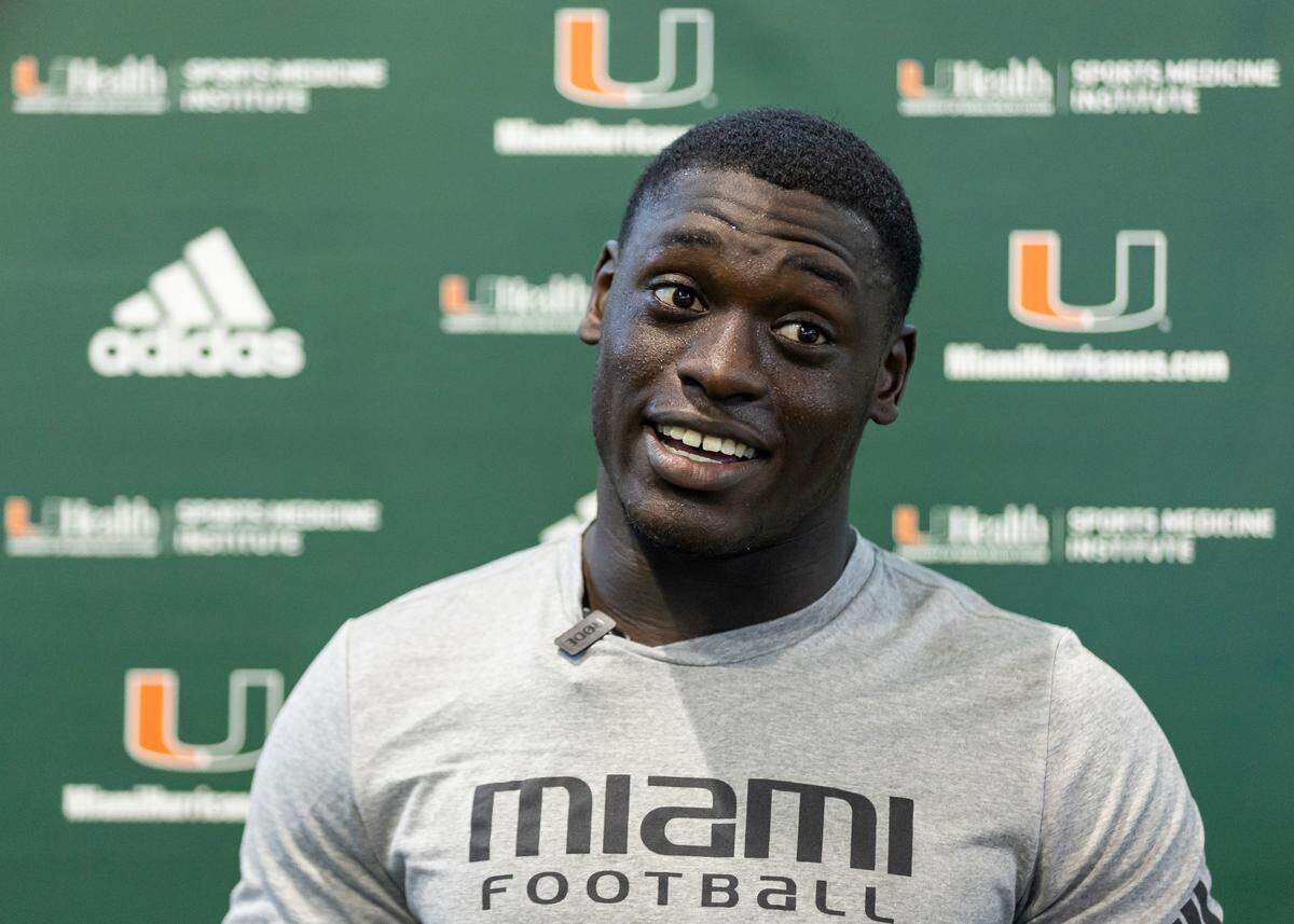 Miami Hurricanes linebacker Wesley Bissainthe (31) speaks to reporters after practice at the Carol Soffer Indoor Practice Facility at the University of Miami on Wednesday, Aug. 8, 2023 in Coral Gables, Fla.