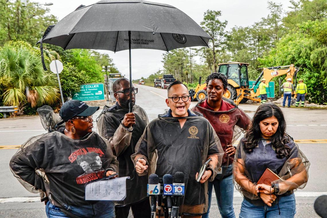 Florida state Sen. Carlos G. Smith and fellow lawmakers speak to the media before being denied entry into Alligator Alcatraz, the state immigration detention facility in the Everglades, on Thursday, July 3, 2025.