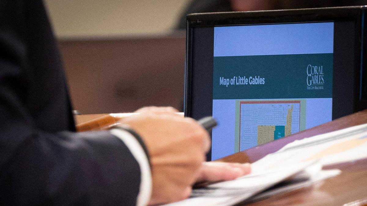 Jorge Duyos, the city’s hired consultant for annexation, gives a presentation on the potential annexation of Little Gables during a Coral Gables City Commission meeting on Tuesday, Nov. 14, 2023, at City Hall in Coral Gables.