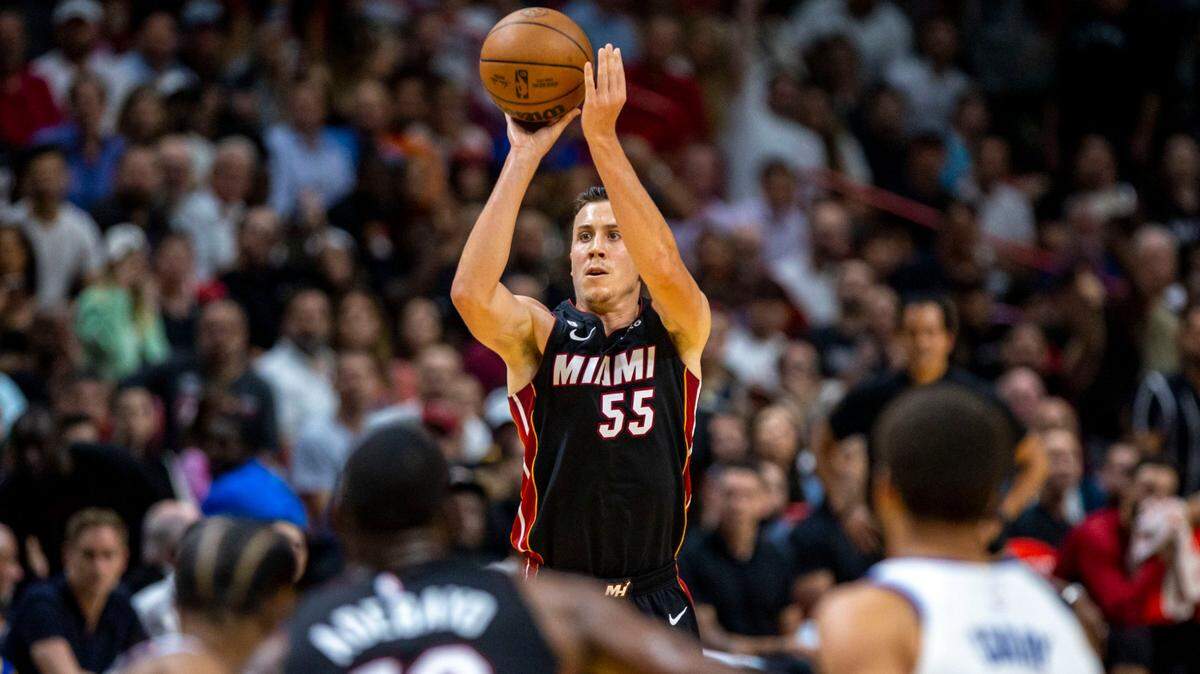 Miami Heat forward Duncan Robinson (55) shoots the three-pointer during an NBA game against the Golden State Warriors at FTX Arena in Downtown Miami, Florida, on Tuesday, November 1, 2022.