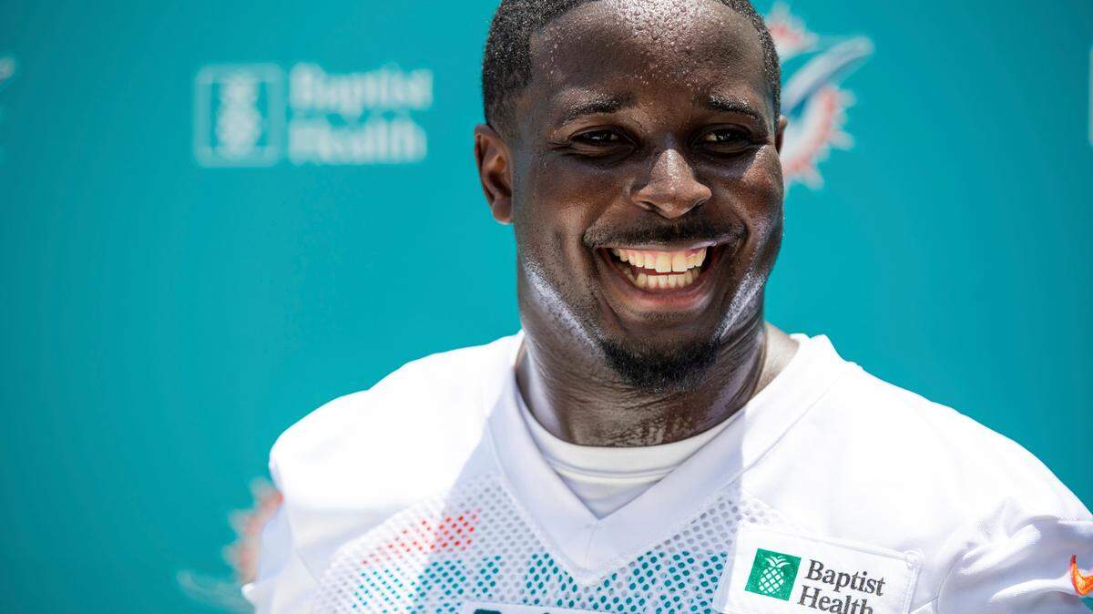 Miami Dolphins running back Sony Michel speaks with the media at the NFL football team’s practice facility in Miami Gardens, Fla., Tuesday, May 17, 2022. (AP Photo/Mary Holt)