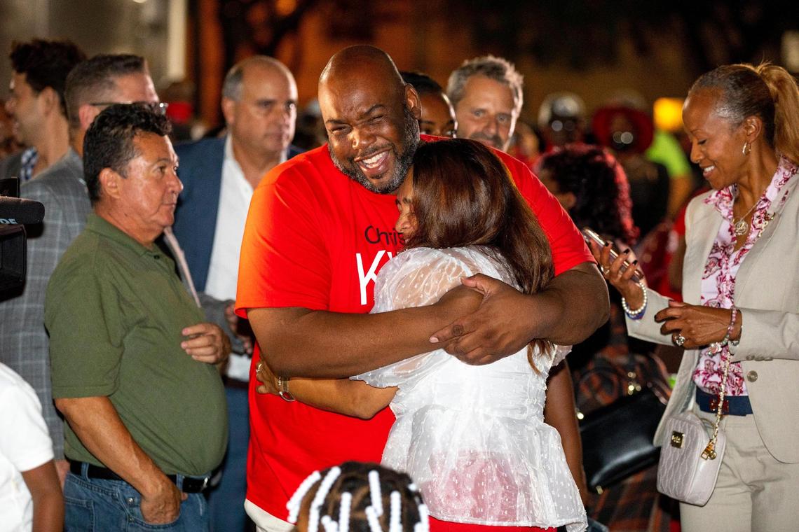 Christine King is hugged by family friend Kenemo Williams after her District 5 victory at King’s Liberty City campaign headquarters on Tuesday, Nov. 2, 2021.