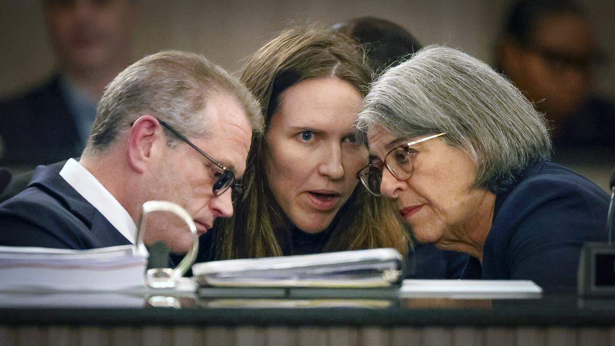 Miami-Dade Mayor Daniella Levine Cava, at right, huddles with Chief Budget Officer David Clodfelter and Deputy Chief of Staff Rachel Johnson during the 2026 budget proposal meeting at the Stephen P. Clark Government Center in Miami on Thursday, Sept. 4, 2025. 