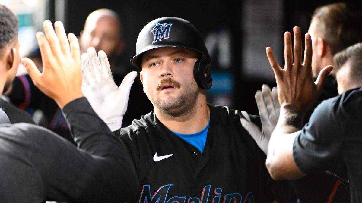 Sep 1, 2023; Washington, District of Columbia, USA; Miami Marlins third baseman Jake Burger (36) is congratulated by teammates after hitting a RBI sacrifice fly during the third inning against the Washington Nationals at Nationals Park.