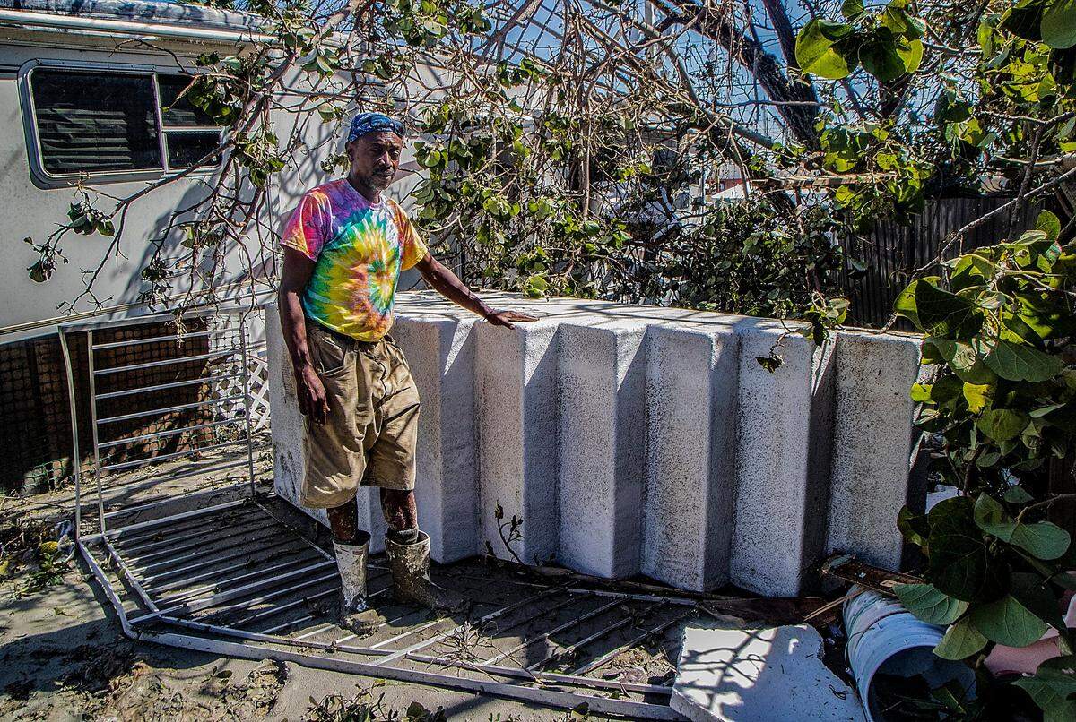 Shawn Hunte, a resident at Sunnyland Court Mobile Home Park in San Carlos Island, talks about grabbing onto a floating fiberglass staircase as Hurricane Ian hit Florida’s west coast as a Category 4 storm on Sept. 28, 2022.