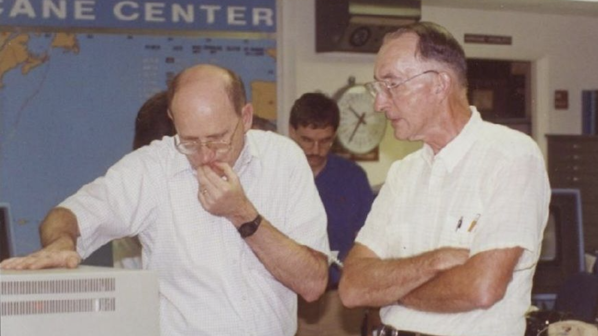 Hurricane expert Paul Hebert, right, with National Hurricane Center Director Jerry Jarrell in a 1970 photo at the center in Miami. Hebert, whose research of hurricane tracks uncovered trouble zones that would become known as ‘Hebert Boxes,’ died last month.