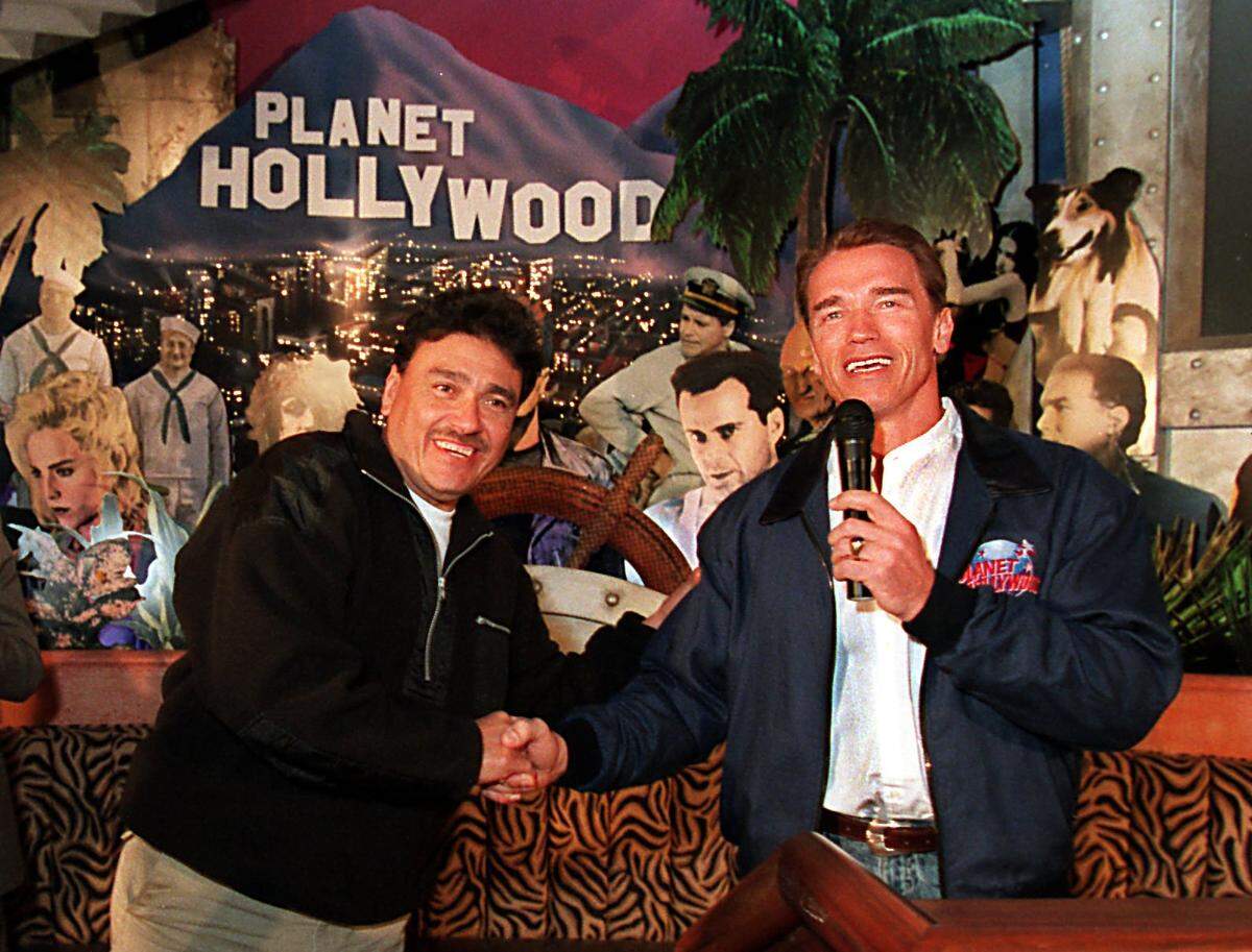 In 1995, City Games Foundation Co-Chairmen Danny Hernandez and Arnold Schwarzennegger meet in Miami’s Planet Hollywood restaurant.