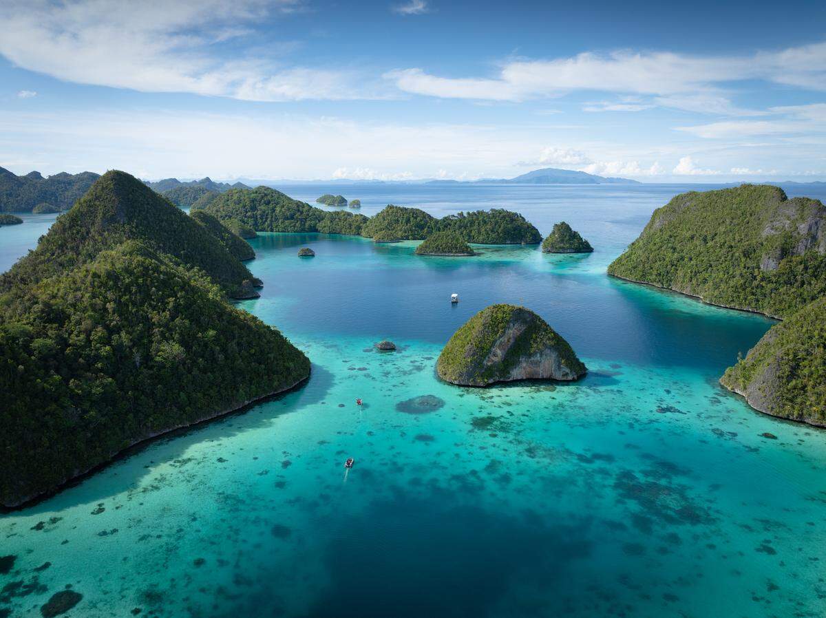 Seabourn destinations include the Raja Ampat region of Indonesia, known for its reefs and marine life.
