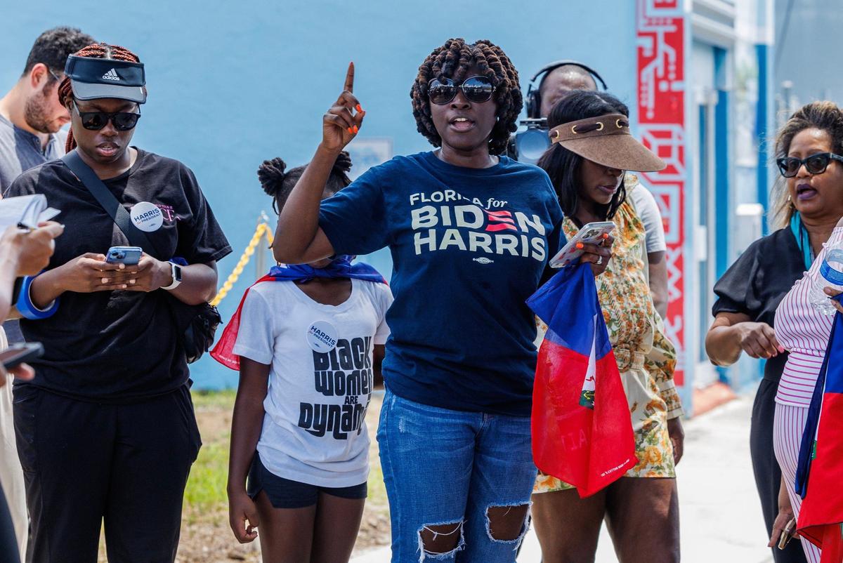 Nancy Metayer Bowen, Director of the Florida Caribbean Vote, speaks during a gathering before the departure of a caravan led by Haitian organizers to show support for the Harris campaign that began at the Little Haiti Cultural Center in Miami and traveled to the North Miami Library on Saturday, August 10, 2024.