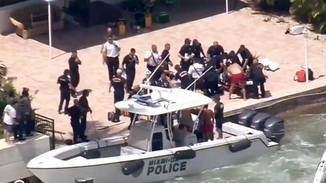First reponders gather in the area where a sailboat sank off Biscayne Bay in Miami Beach, near Hibiscus Island, on Monday morning, July 28, 2025. The boat was carrying five campers and a camp counselor from the Miami Yacht Club on Watson Island. A barge crashed into the sailboat, authorities say.