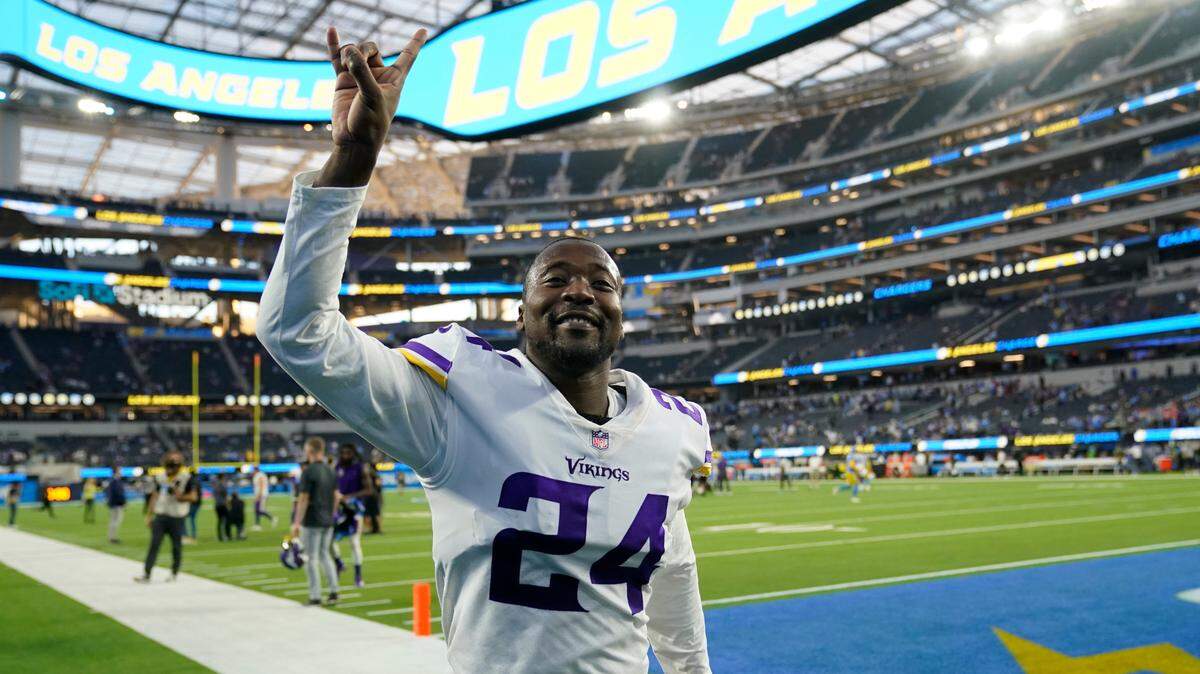Minnesota Vikings cornerback Mackensie Alexander (24) waves to fans as he leaves the field after a 27-20 win over the Los Angeles Chargers in an NFL football game Sunday, Nov. 14, 2021, in Inglewood, Calif. (AP Photo/Marcio Jose Sanchez)