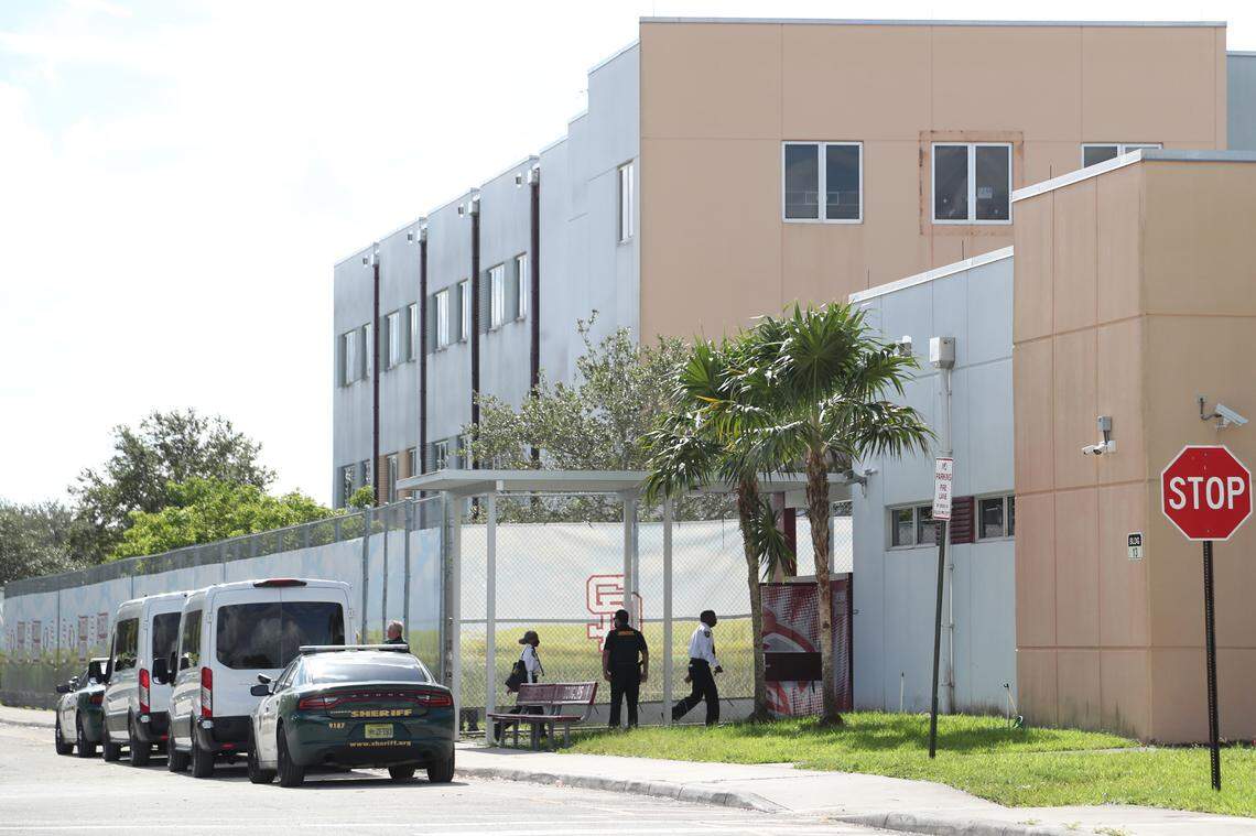Court deputies exit vans that transported jurors to Marjory Stoneman Douglas High School in Parkland on Thursday to view the “1200 building,” the crime scene where the 2018 shootings took place. This occurred during the penalty phase in the trial of shooter Nikolas Cruz, who previously pleaded guilty to all 17 counts of premeditated murder and 17 counts of attempted murder.
