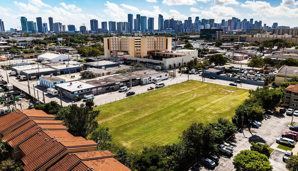 Stadium Towers Apartments will replace a 1.5-acre vacant lot, pictured above, on the northwest corner of Northwest 23rd Street and Northwest 8th Avenue.