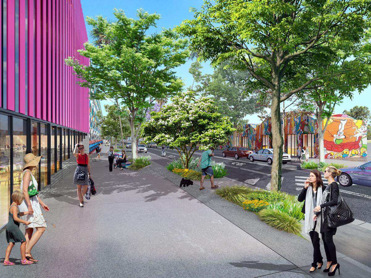A conceptual rendering shows how Northwest 28th Street in Wynwood could look with expanded sidewalks, new crosswalks and new trees and greenery under a streetscape and landscape master plan now under design.