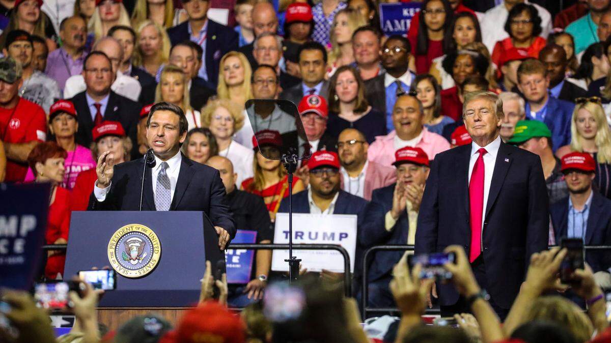 File photo of Florida Gov Ron DeSantis with former President Donald Trump at a Make America Great Again Rally at the Florida State Fair in Tampa on July 31, 2018.