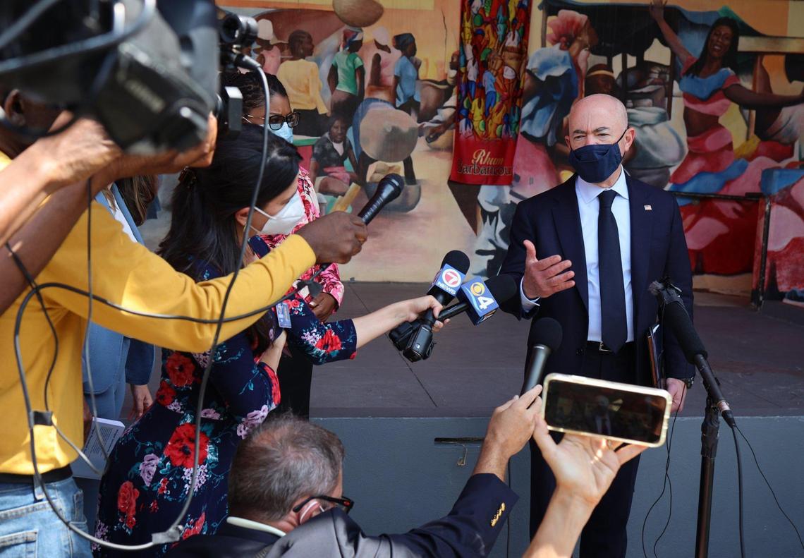 DHS Secretary Alejandro Nicholas Mayorkas, right, talks with the press after meeting with Haitian community leaders to make good on President Joe Biden’s promise regarding TPS during a meeting inside the gallery at the Little Haiti Culture Complex on Tuesday, May 25, 2021.