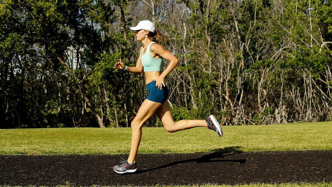 Rain in the Fitbit Miami Marathon? This elite local runner has been through far worse