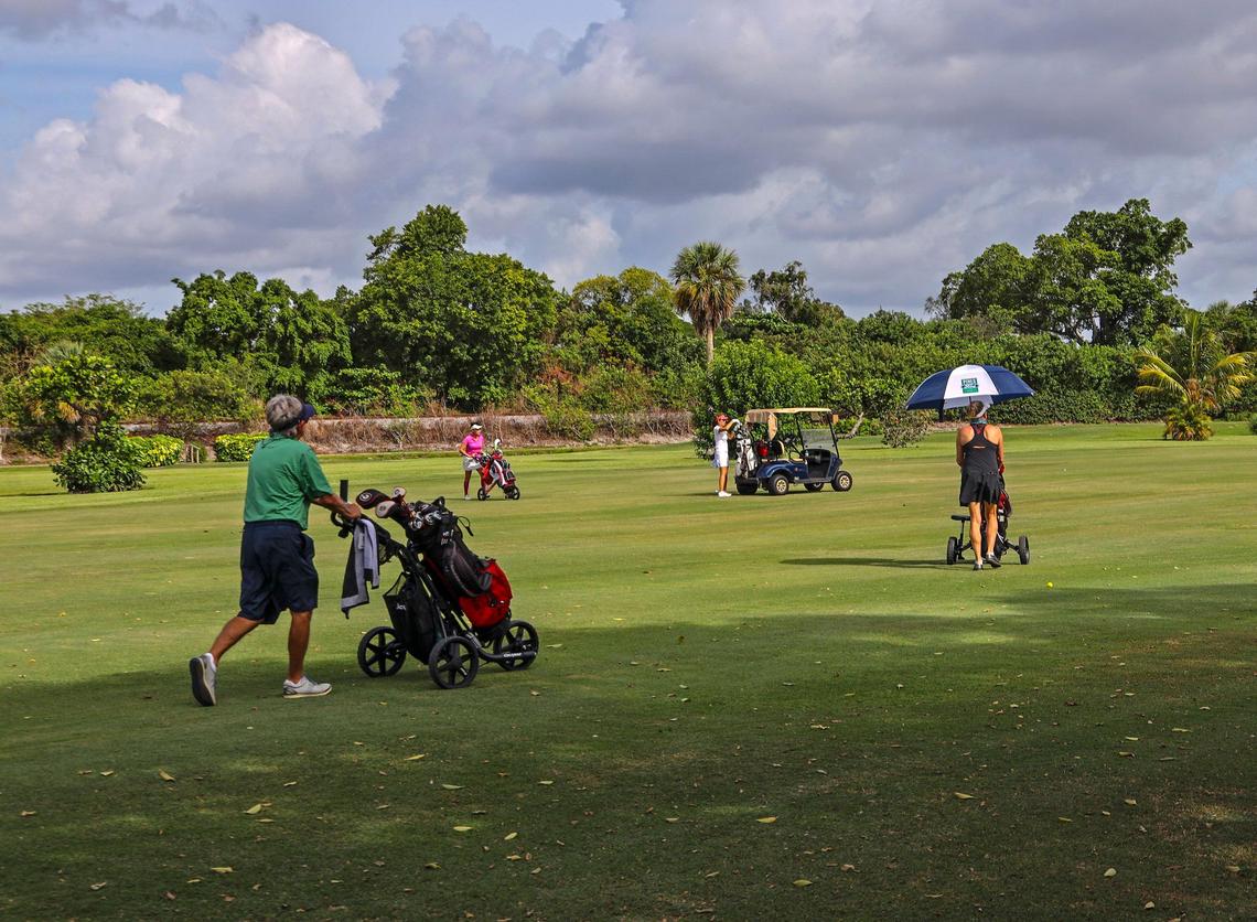 Golfers return to the greens and fairways of Miami Shores Country Club while keeping proper social distancing as Miami-Dade reopened some public spaces on Wednesday, April 29, 2020.