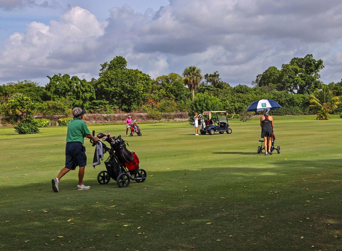 Golfers return to the greens and fairways of Miami Shores Country Club while keeping proper social distancing as Miami-Dade reopened some public spaces on Wednesday, April 29, 2020.