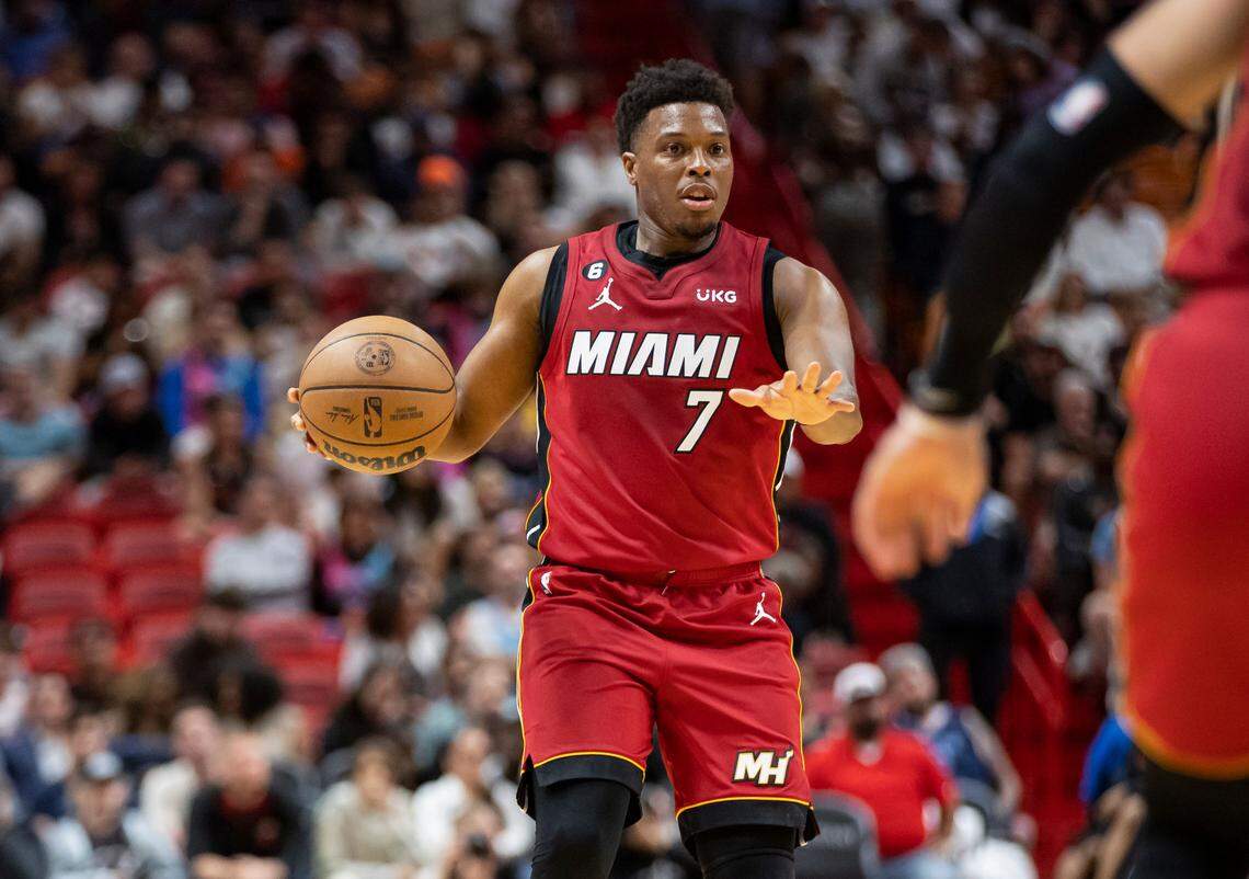 Miami Heat guard Kyle Lowry (7) looks to pass against the Memphis Grizzlies during the fourth quarter of an NBA game at Miami-Dade Arena on Wednesday, March 15, 2023, in Miami.