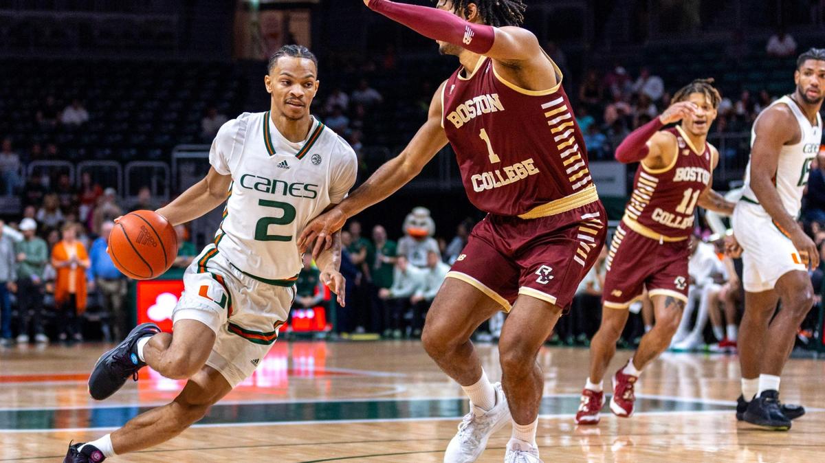 Hurricanes guard Isaiah Wong (2) drives on Boston College forward T.J. Bickerstaff (1) during the first half of a men’s NCAA basketball game at Watsco Center in Coral Gables, Florida, on Wednesday, January 11, 2023.