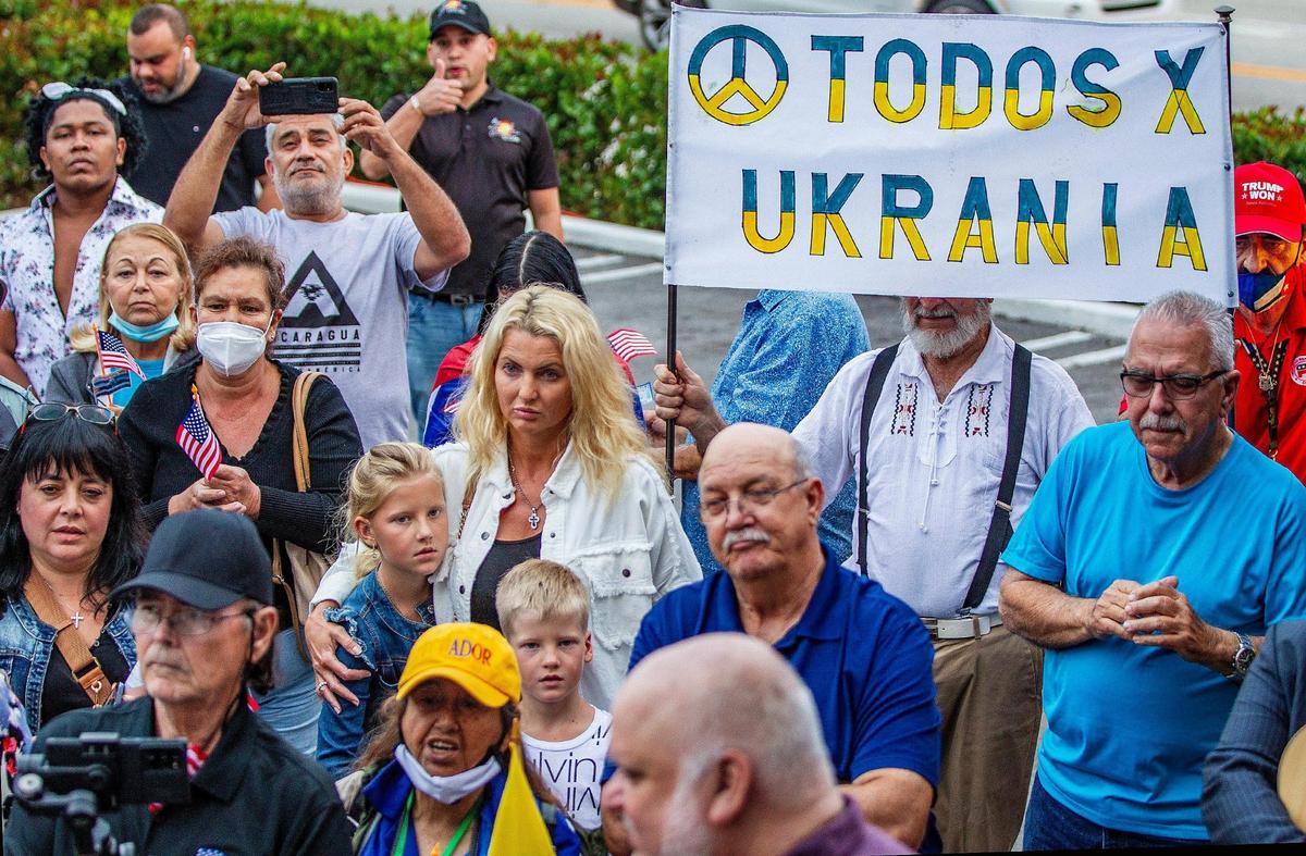 A Ukrainian tourist visiting Miami, Victoria Averkova, and her children, Sonya and Make, joined a rally called by exile communities including Cubans, Nicaraguans, Argentinians and Venezuelans, supporting Ukraine’s fight against the Russian invasion, on Wednesday March 2, 2022,