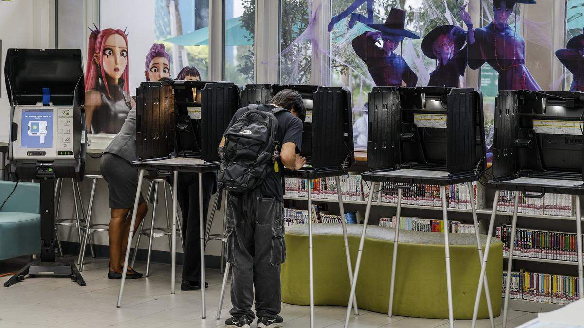 Halloween decorations on display as voters cast their votes at Shenandoah Branch Library at Shenandoah Park in Miami on Tuesday, November 4, 2025.