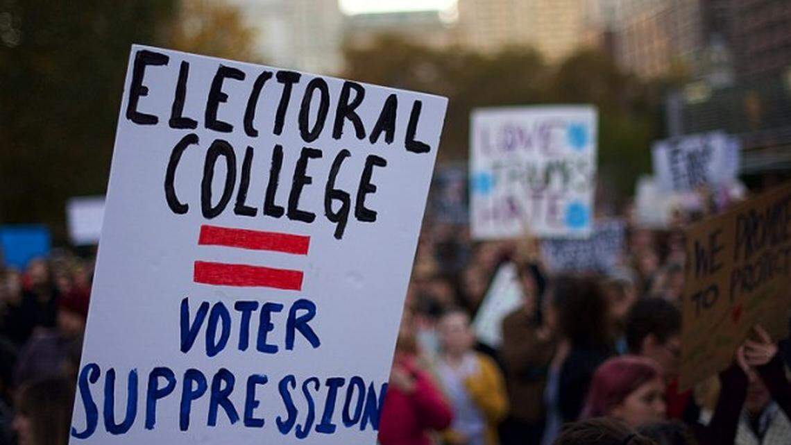 In 2016, people in Philadelphia protest the election of Donald Trump as president. He won the Electoral College, but lost the popular vote.