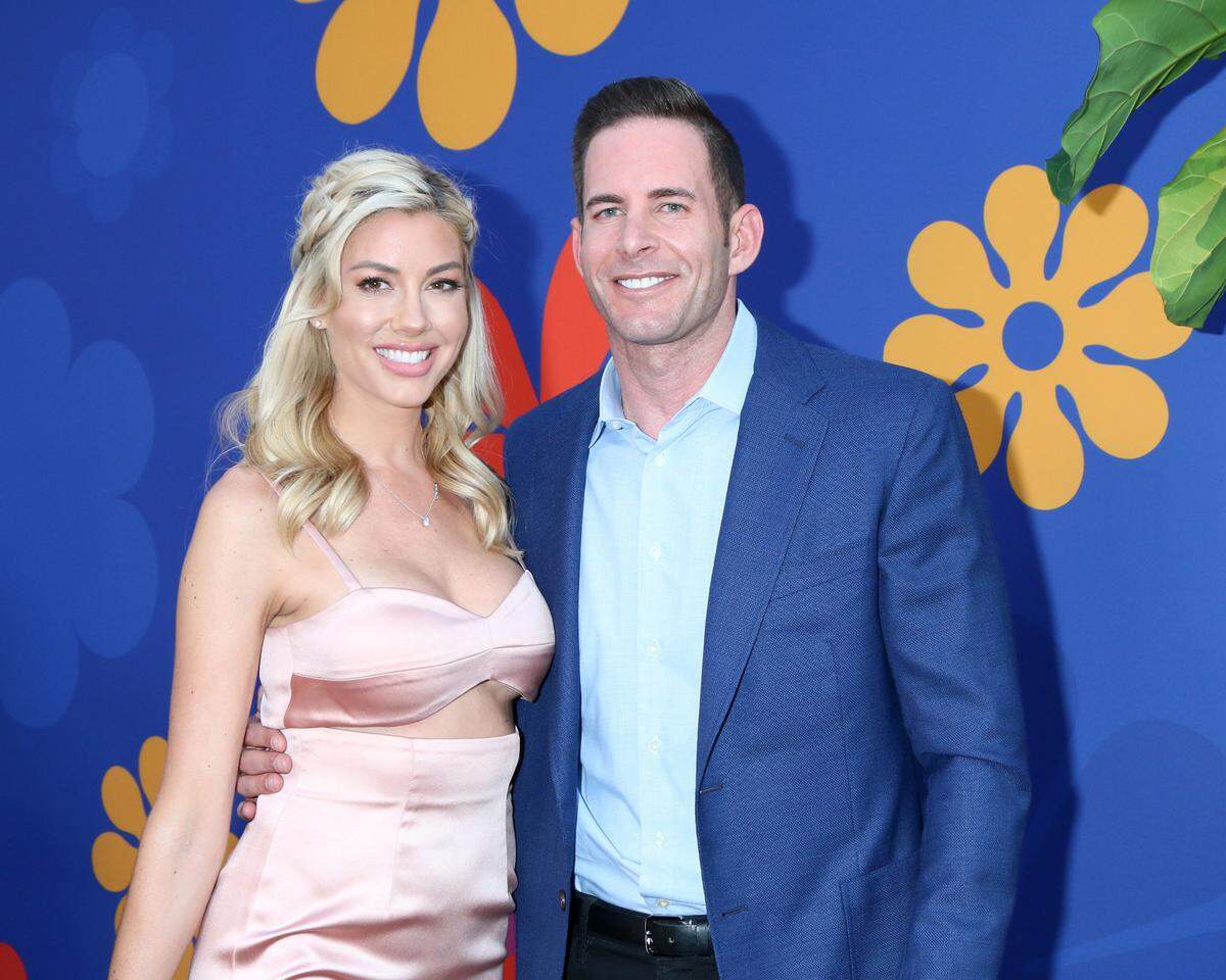 Tarek El Moussa with his wife Heather Rae El Moussa