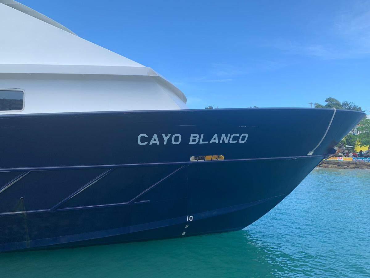 The Cayo Blanco docks in the port of Vieques on March 10, 2020, after a group of swimmers blocked it from entering in protest.