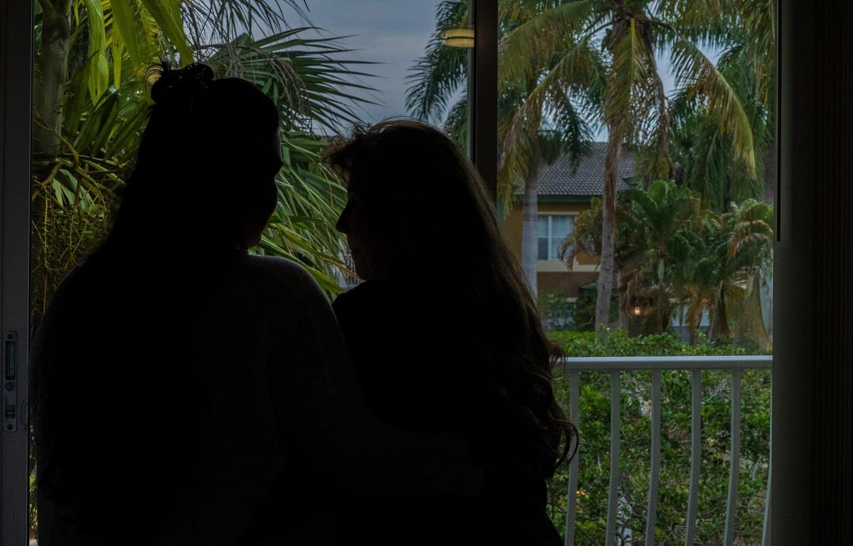 Michelle Valdes (left) spends time with her mother who is undocumented and plans to leave the United States for her native Colombia, leaving behind her daughter and life of over two decades.