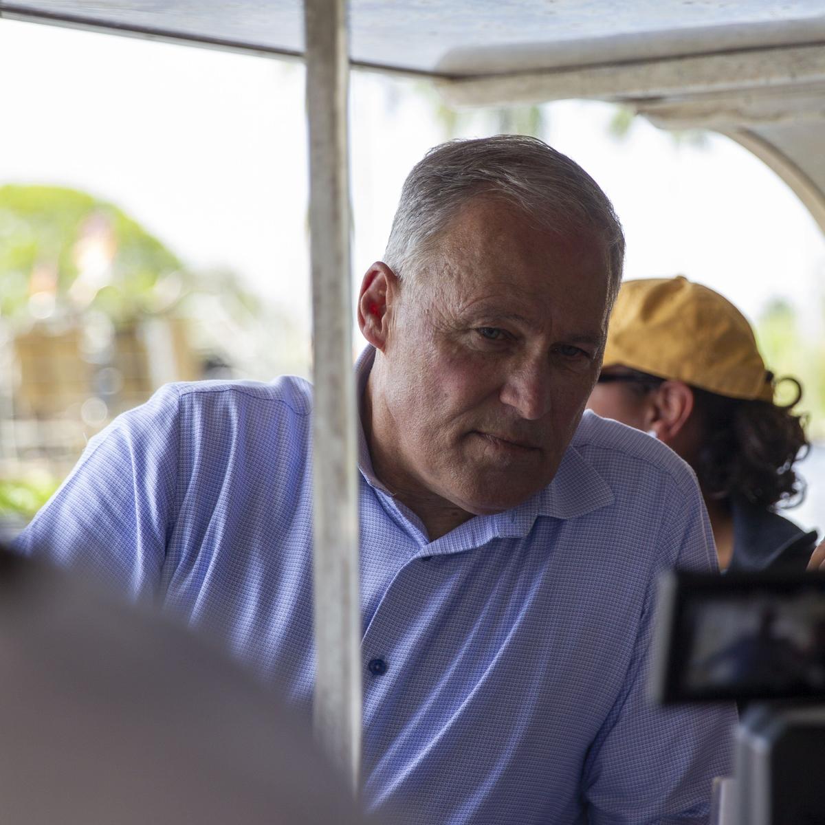 Washington Gov. Jay Inslee, who is seeking the Democratic presidential nomination with a campaign that focuses on the environment, answers questions from the media while riding an airboat at Everglades Holiday Park in Fort Lauderdale, Florida, on Monday, June 24, 2019.
