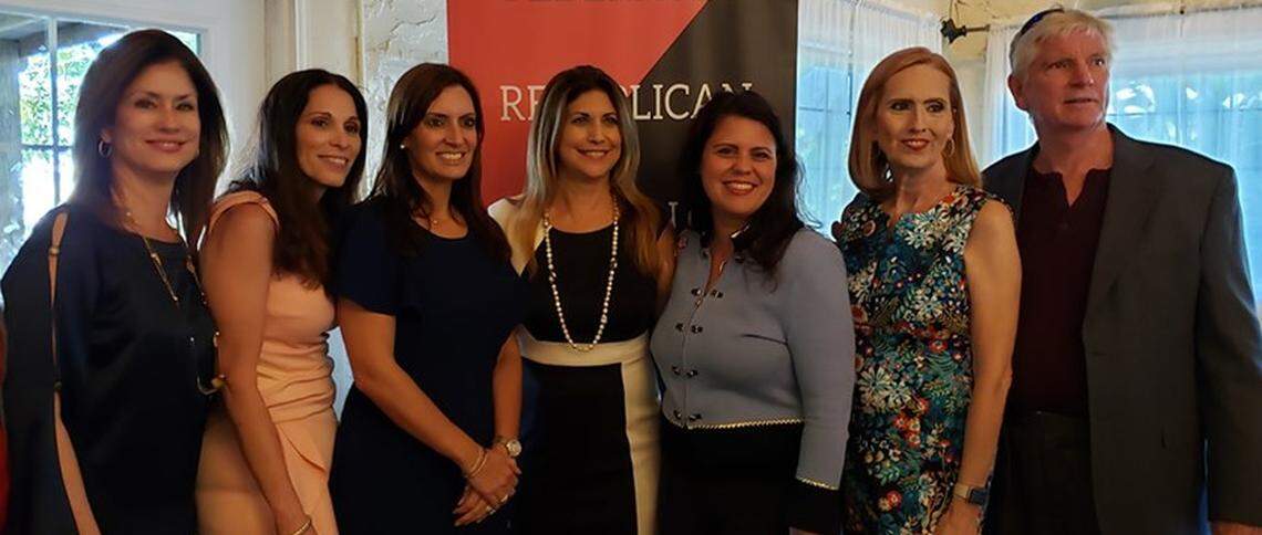 Lt. Gov. Jeanette Núñez, third from left, Federated Republican Women of North Dade President Maricel Cobitz and state Rep. Ana Maria Rodríguez pose with attendees at the group’s Miami event Aug. 14.