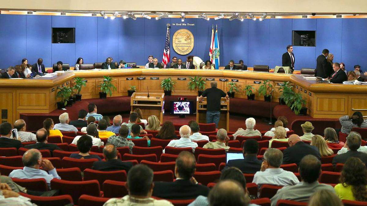 A proposal would pay former Miami-Dade County commissioners $25,000 a year to be community “ambassadors.”